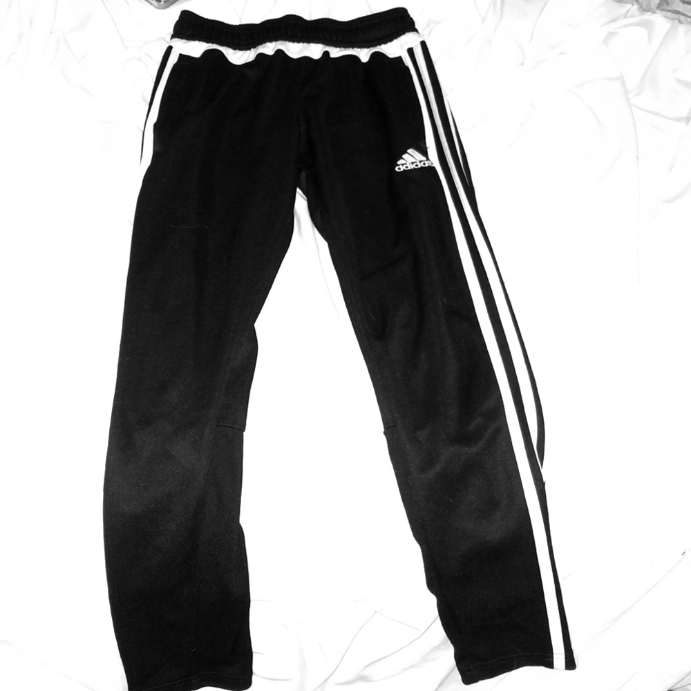 black and white striped adidas pants.